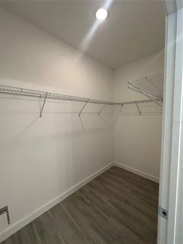 a view of a room with racks on the wall