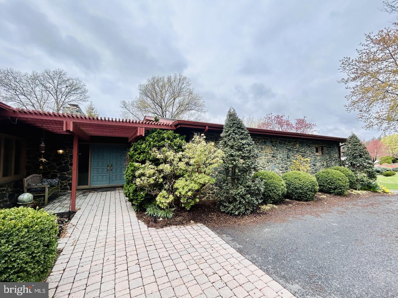 14820 Old York Road Phoenix, MD 21131 - Photo 1 of 22 a front view of a house with garden