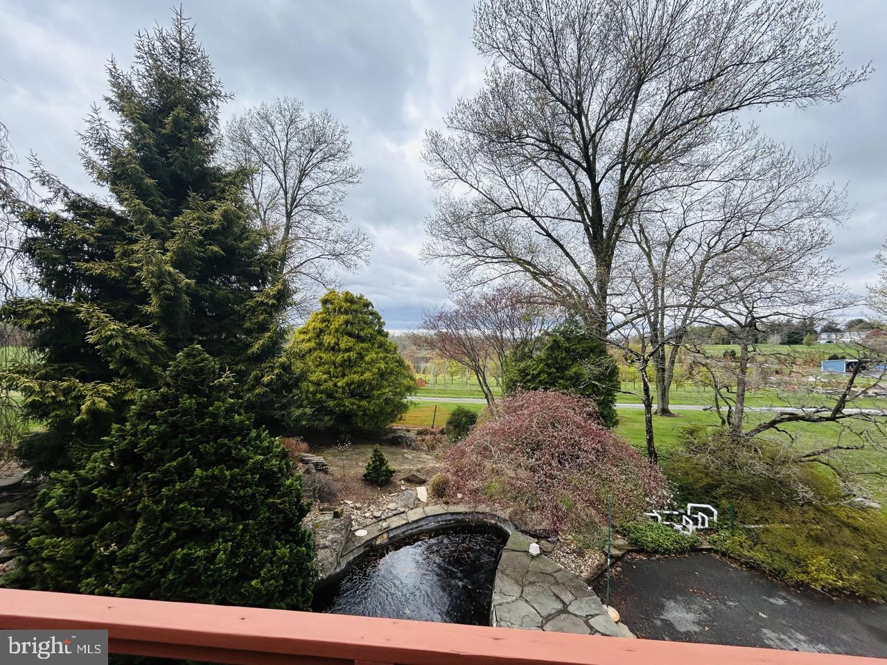 14820 Old York Road Phoenix, MD 21131 - Photo 19 of 22 a view of a street with a large tree