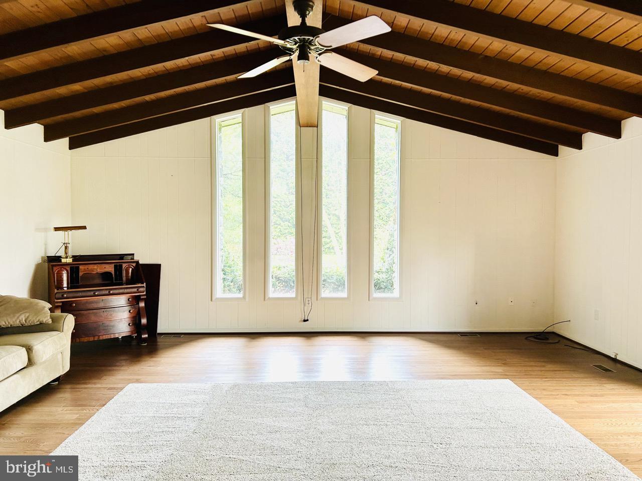 14820 Old York Road Phoenix, MD 21131 - Photo 10 of 22 a view of a room with wooden floor and furniture