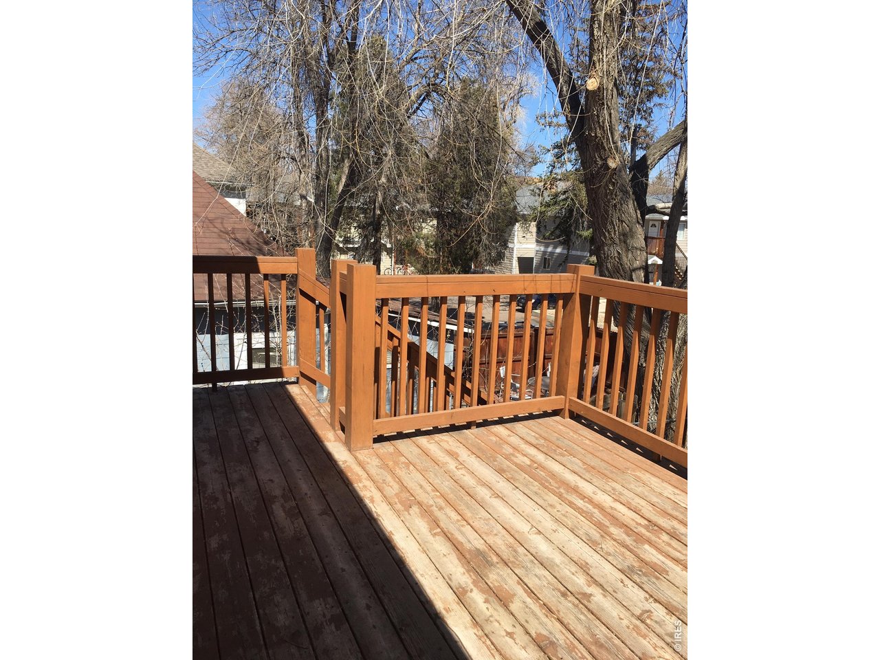 612 South Howes Street Fort Collins, CO 80521 - Photo 16 of 18 a view of a wooden fence
