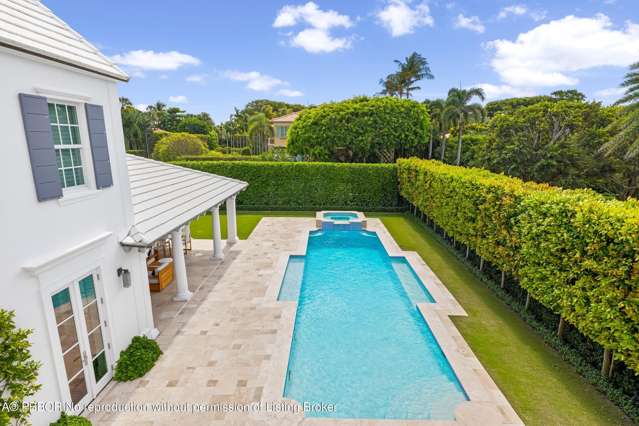 201 Banyan Road Palm Beach, FL 33480 - Photo 39 of 42 a view of house with garden space and car parked