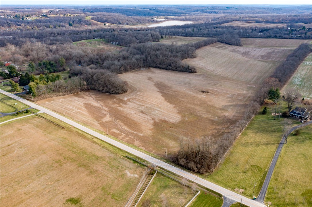 Lot 1 Lot Road Springboro, OH 45066 - Photo 4 of 13 Vast open fields and lush woodlands with distant water views provide a serene natural setting.
