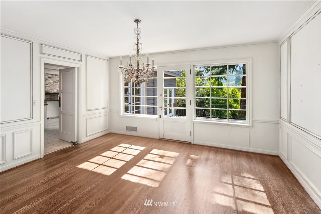 5527 Northeast Windermere Road Seattle, WA 98105 - Photo 5 of 34 a view of an empty room with a window