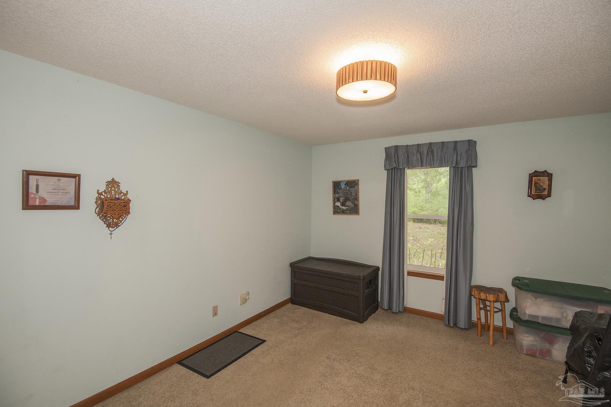 1210 Goldenrod Road Cantonment, FL 32533 - Photo 29 of 50 a view of room with air conditioner and window