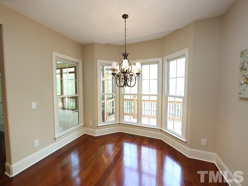 3460 Century Farm Road Wake Forest, NC 27587 - Photo 16 of 25 a view of an empty room with wooden floor and a window