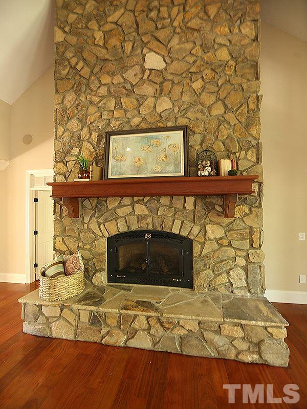 3460 Century Farm Road Wake Forest, NC 27587 - Photo 10 of 25 a view of a fireplace with wooden floor