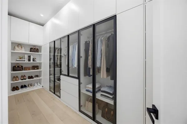 a view of a hallway with closet