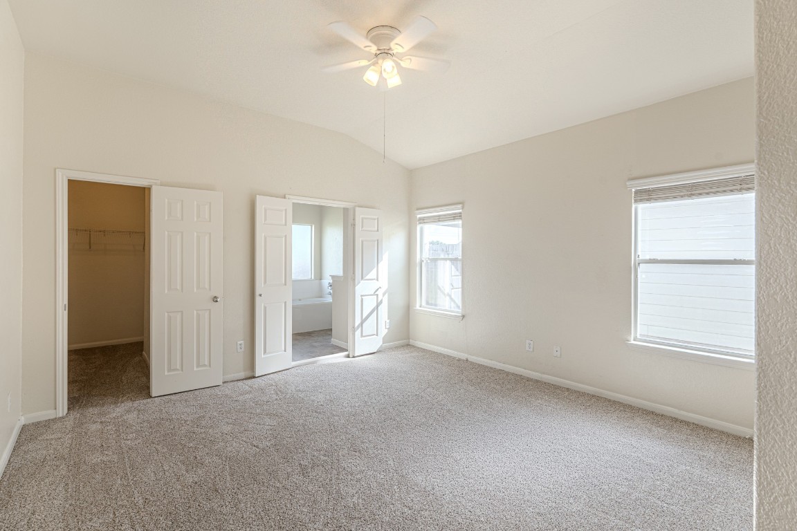 6526 Bella Noche Drive Spring, TX 77379 - Photo 27 of 46 a view of a livingroom with a ceiling fan and window