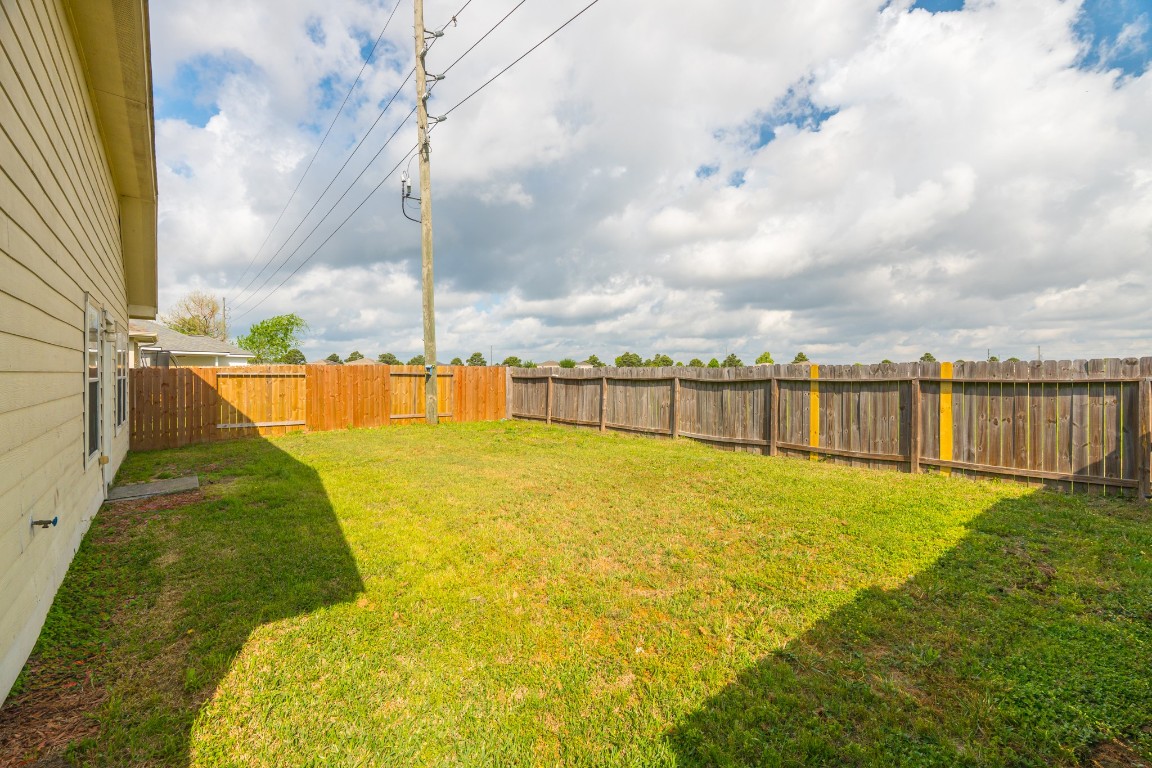 6526 Bella Noche Drive Spring, TX 77379 - Photo 45 of 46 a view of a yard with swimming pool