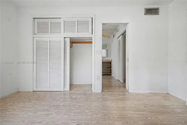 an empty room with closet