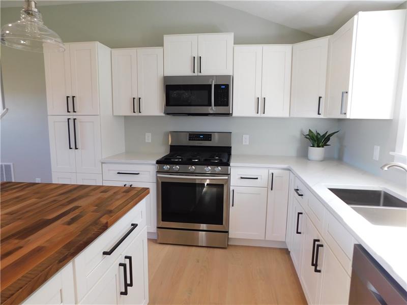 116 Grimm Road Sarver, PA 16055 - Photo 8 of 22 Quartz countertops and stainless steel appliances