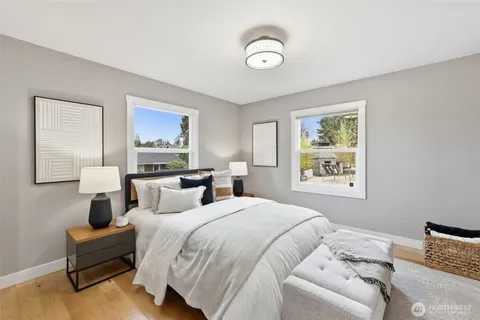 a bedroom with bed and window