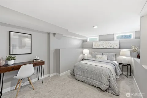 a bedroom with a bed and furniture