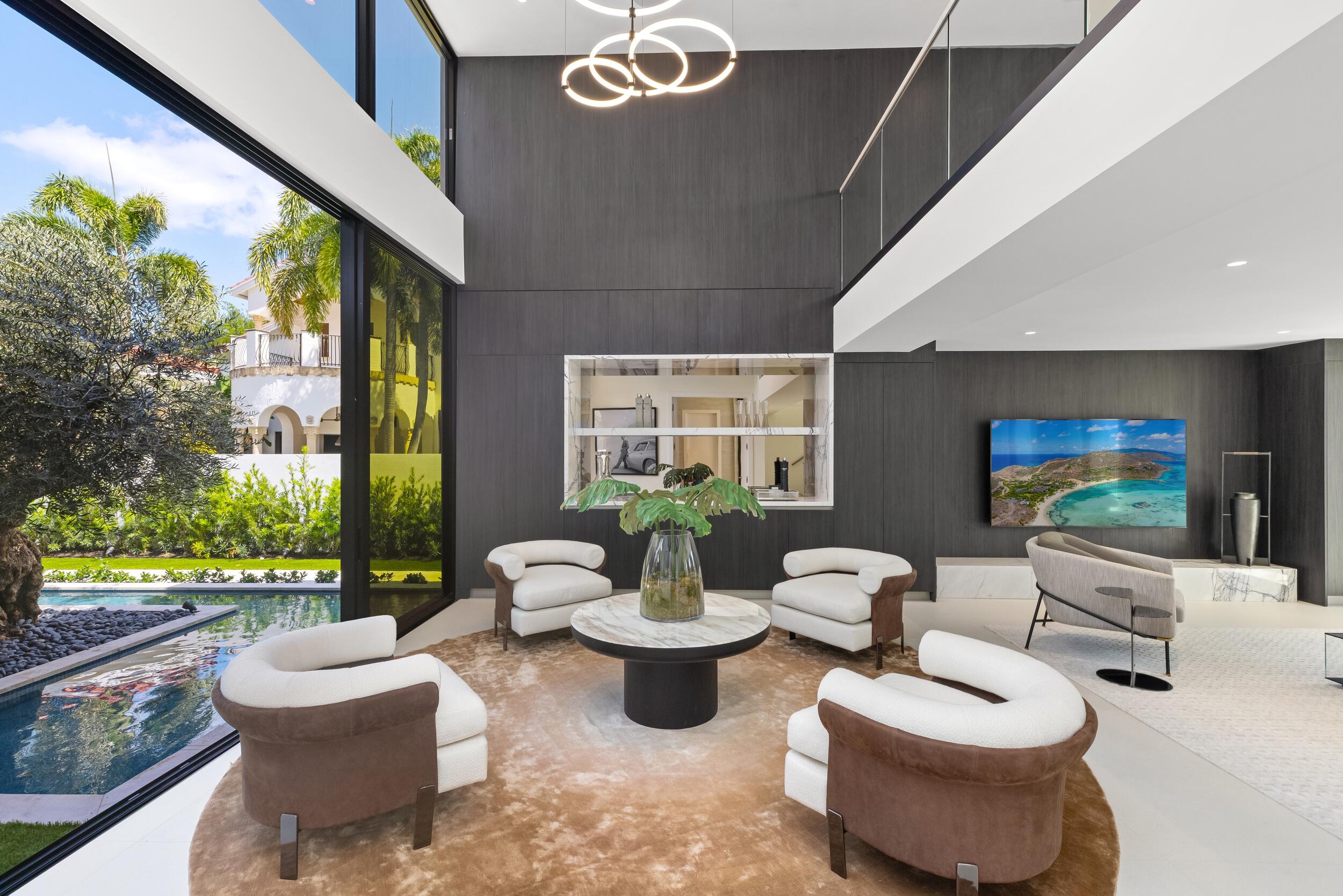 1351 Cocoanut Road Boca Raton, FL 33432 - Photo 21 of 101 a living room with furniture and a large window