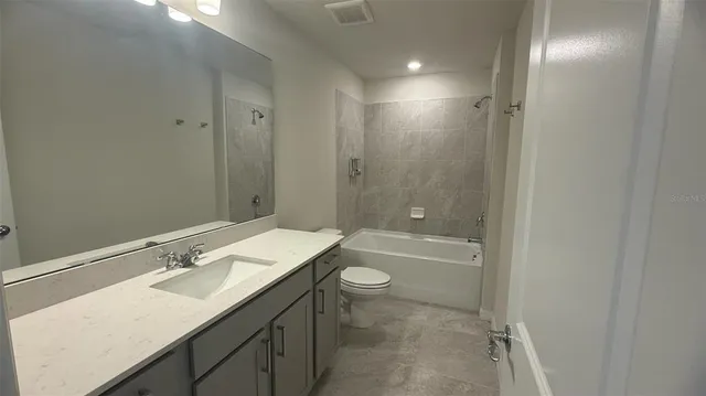 a view of empty room with windows