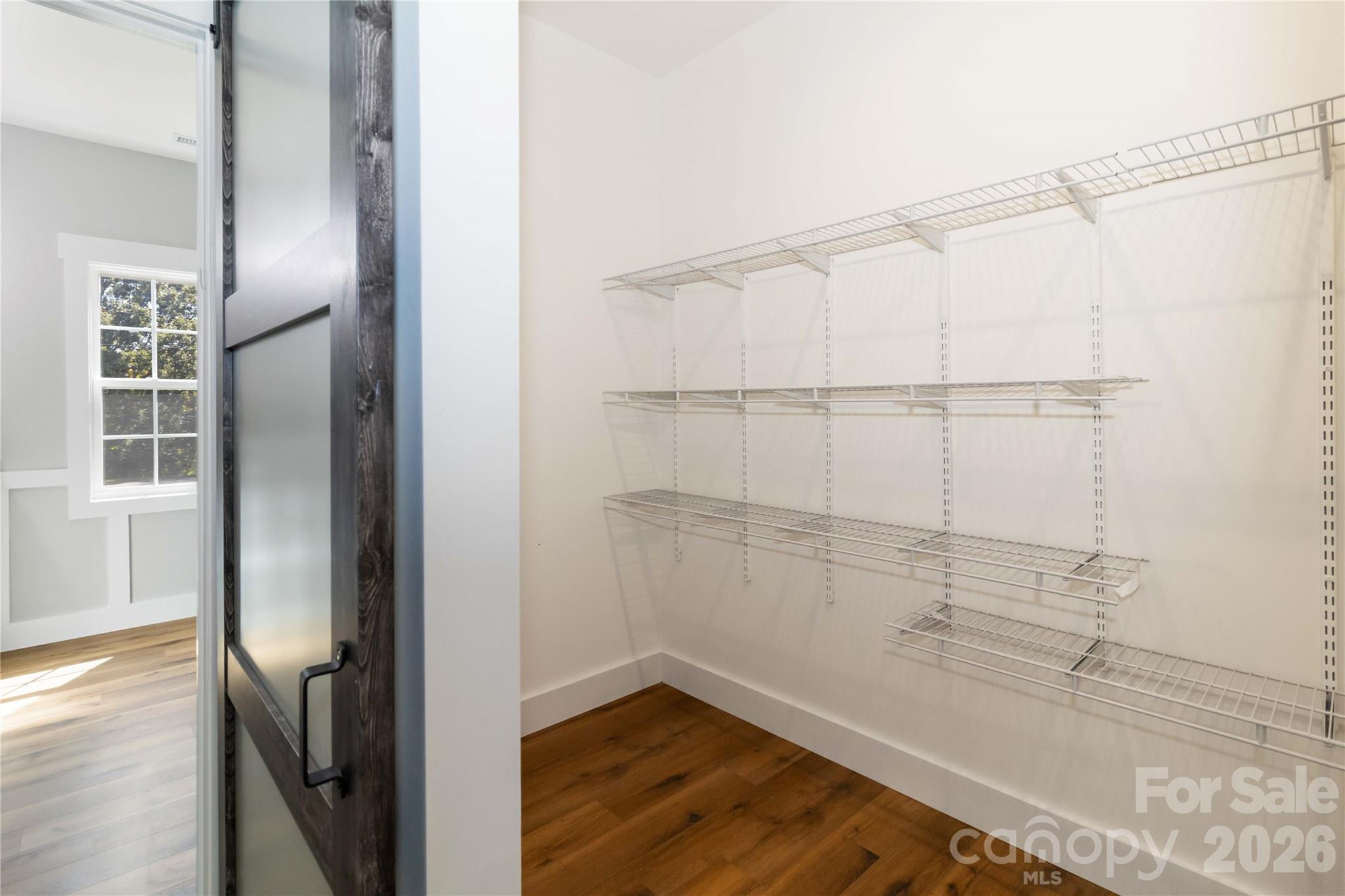 2605 Mt Prospect Road Chester, SC 29706 - Photo 23 of 35 a view of walk in closet with empty racks