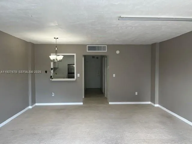 a view of a livingroom with a furniture
