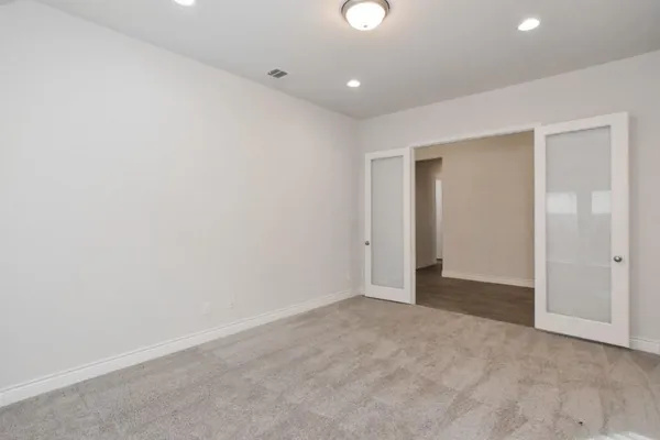 an empty room with an entryway
