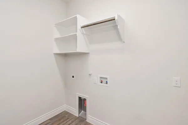 a view of small space with racks on the wall