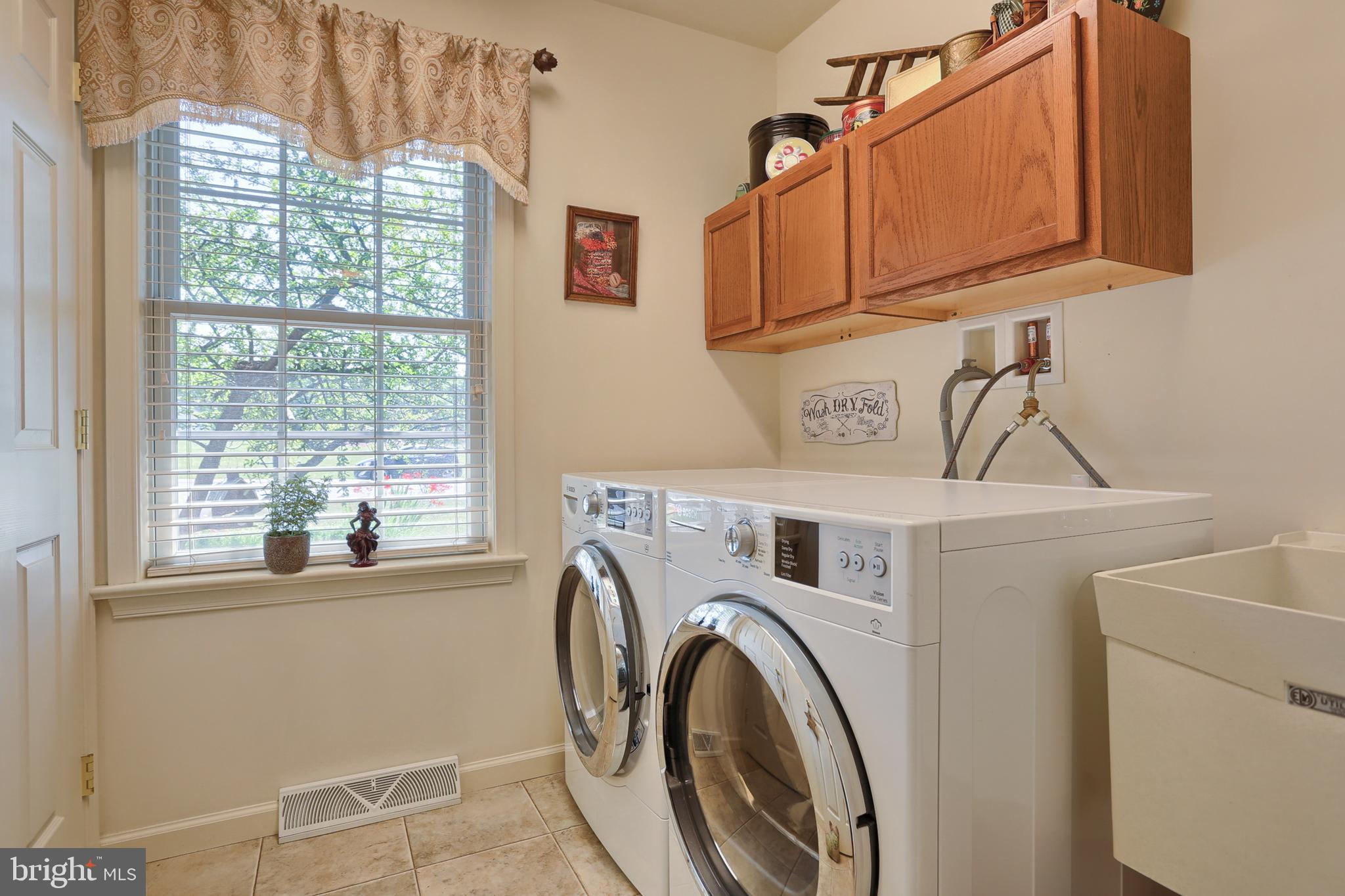 1508 Rolling Meadow Road Lebanon, PA 17046 - Photo 24 of 48 Main level laundry with build in cabinets, sink
