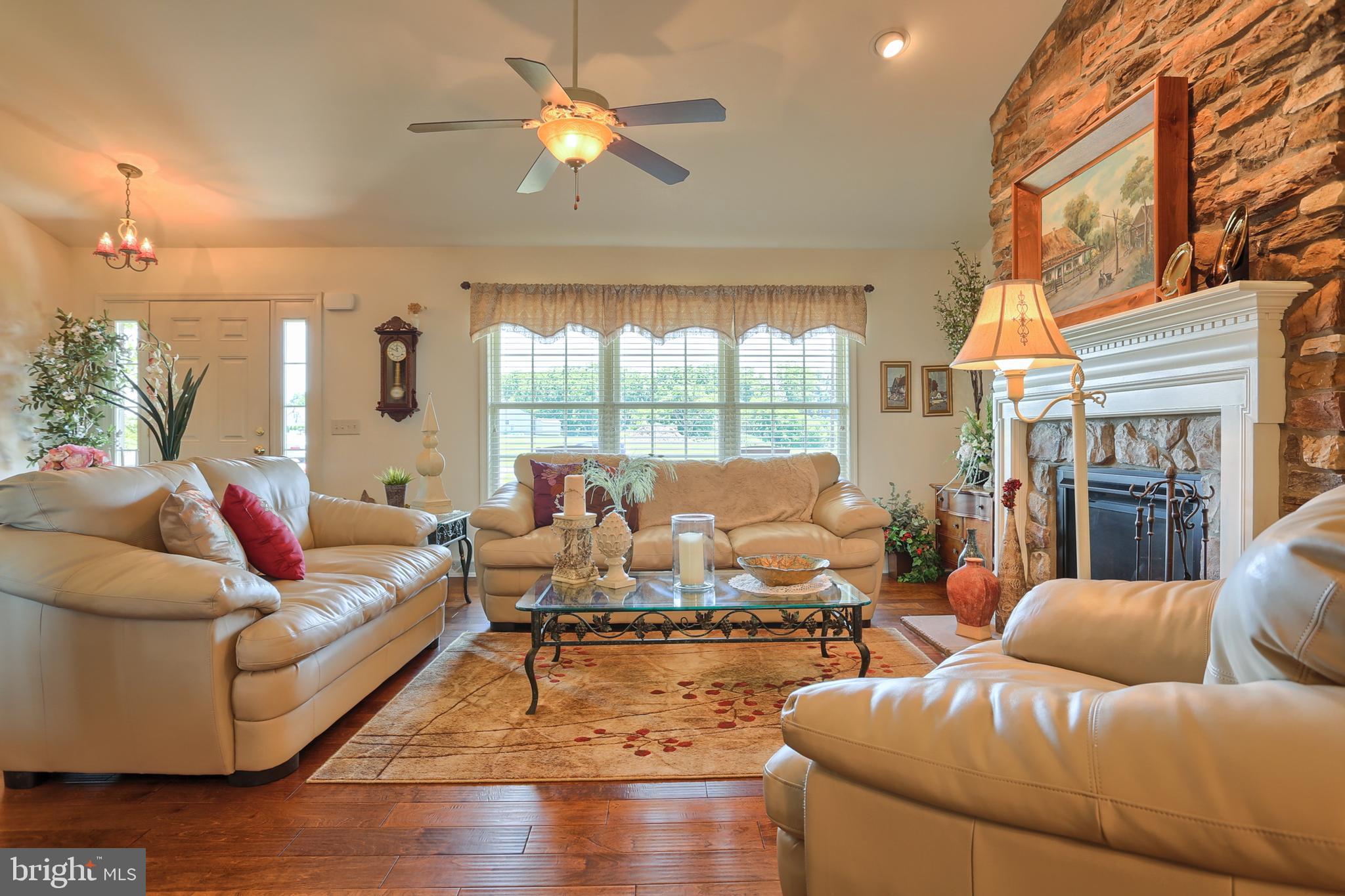 1508 Rolling Meadow Road Lebanon, PA 17046 - Photo 6 of 48 Gorgeous updated flooring, stone hearth, gas FP