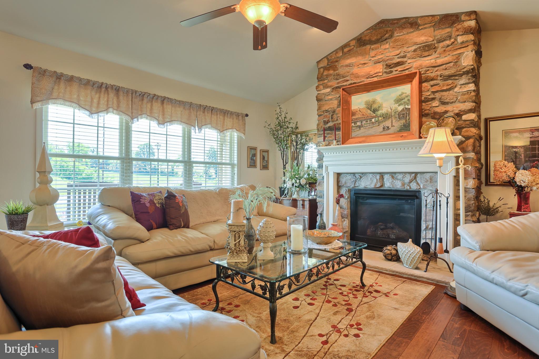 1508 Rolling Meadow Road Lebanon, PA 17046 - Photo 8 of 48 Updated stone hearth, ceiling fan updated flooring