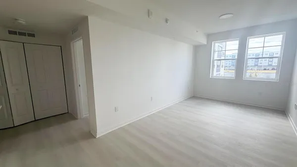 an empty room with windows