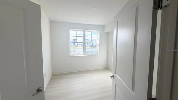 an empty room with a window