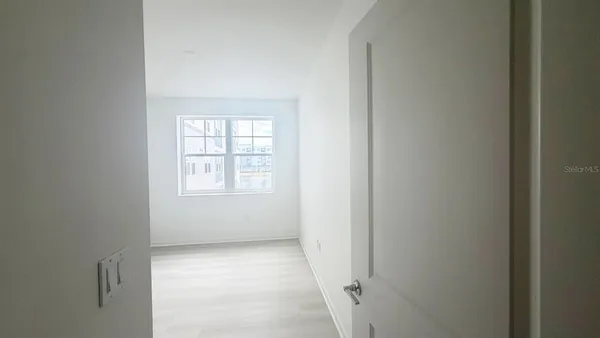 an empty room with a window