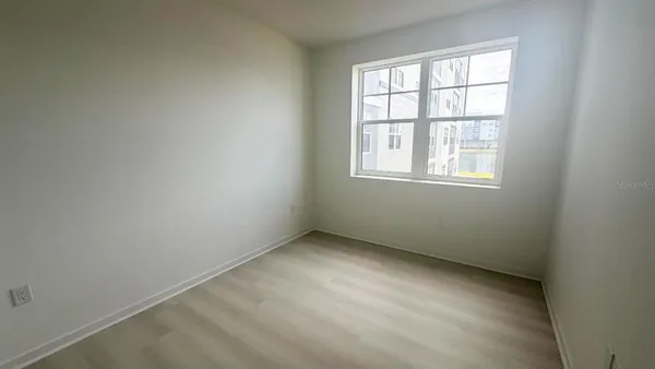 a view of a room with an outdoor view from a window