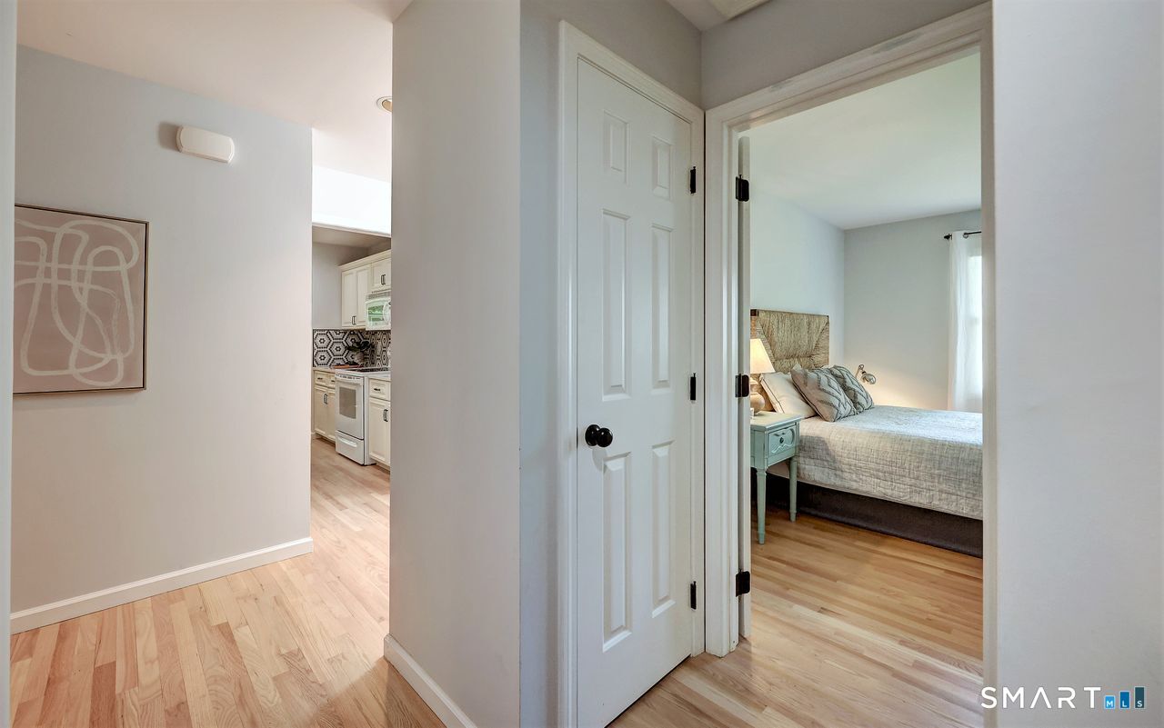 9 Canterbury Road, Unit 9 Hamden, CT 06514 - Photo 19 of 29 a view of a bedroom from hallway