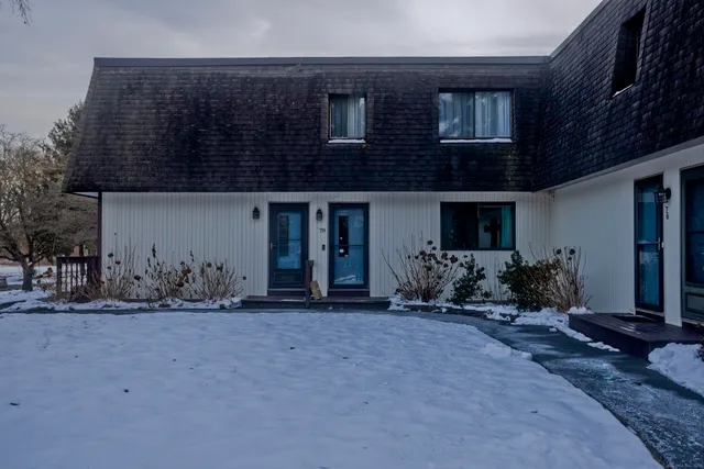 a view of a house with a patio