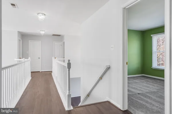 a view of hallway with stairs