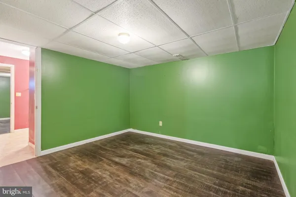 a view of room with window and fan