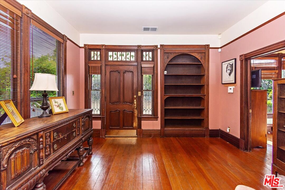 448 North Summit Avenue Pasadena, CA 91103 - Photo 4 of 16 a view of an entryway with wooden floor and windows