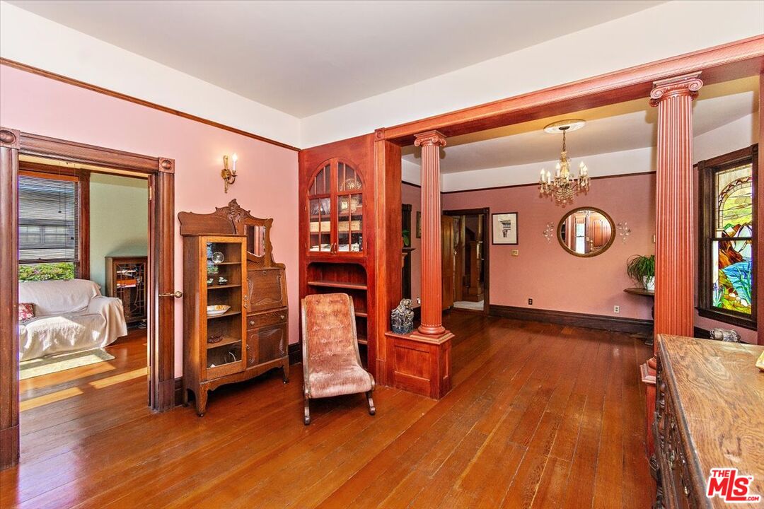 448 North Summit Avenue Pasadena, CA 91103 - Photo 5 of 16 a view of a livingroom with furniture and an empty room