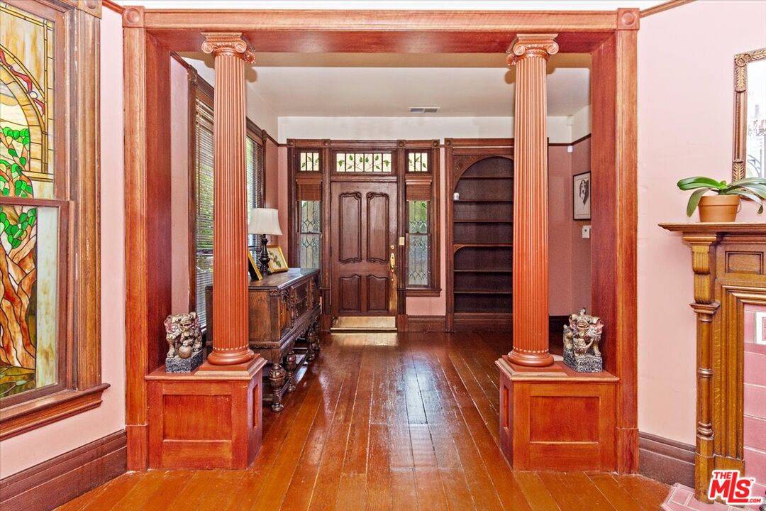 448 North Summit Avenue Pasadena, CA 91103 - Photo 7 of 16 a view of a hallway with wooden floor and entryway