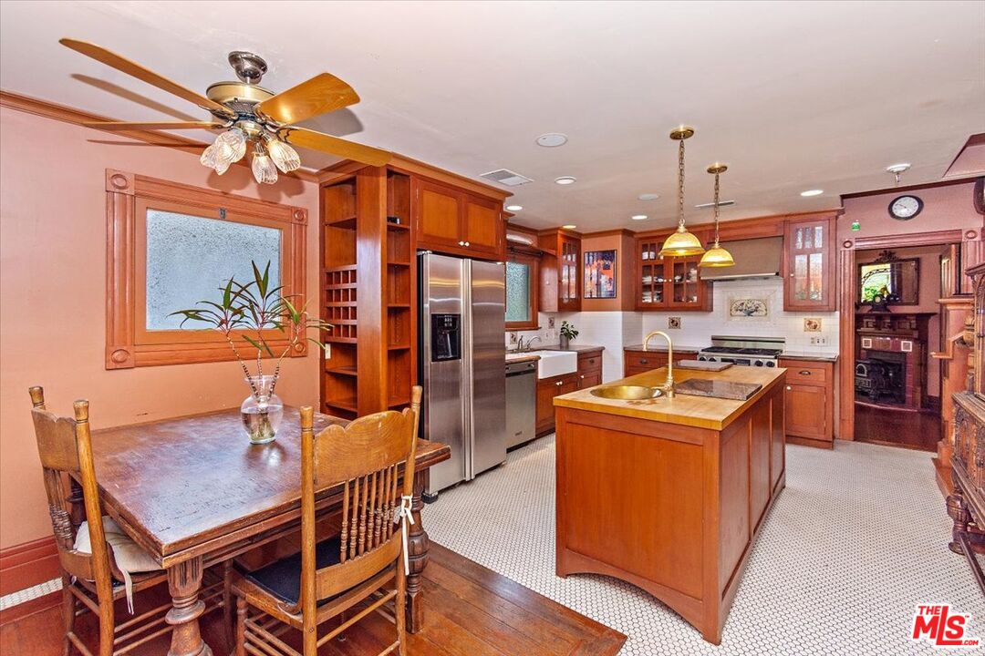448 North Summit Avenue Pasadena, CA 91103 - Photo 9 of 16 a kitchen that has a lot of cabinets in it