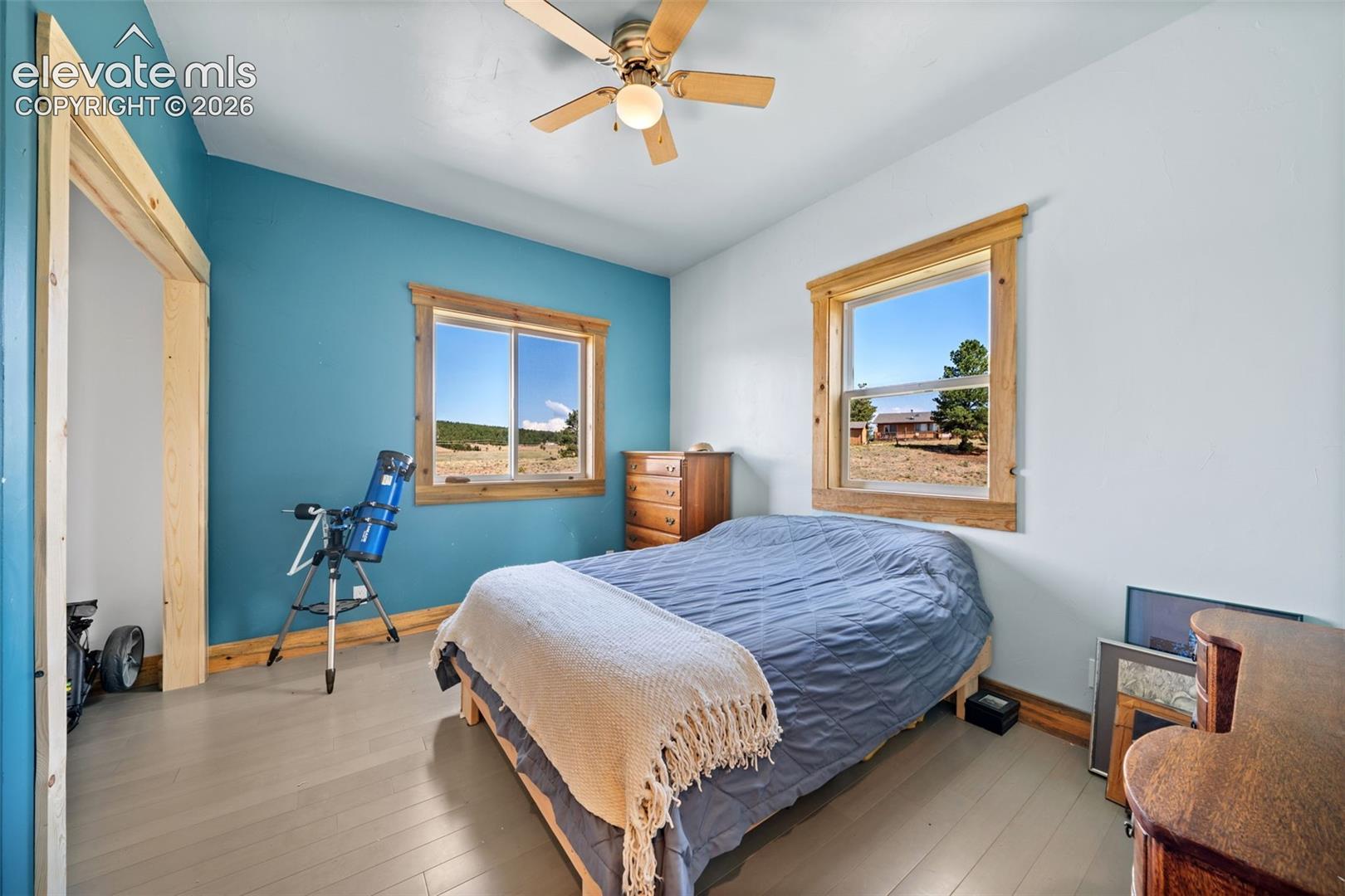 351 High Pasture Road Florissant, CO 80816 - Photo 15 of 42 Spacious main-level bedroom with natural light.