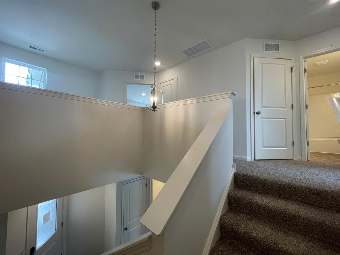 778 Westbury Drive Cary, IL 60013 - Photo 11 of 29 a view of entryway and hall with wooden floor