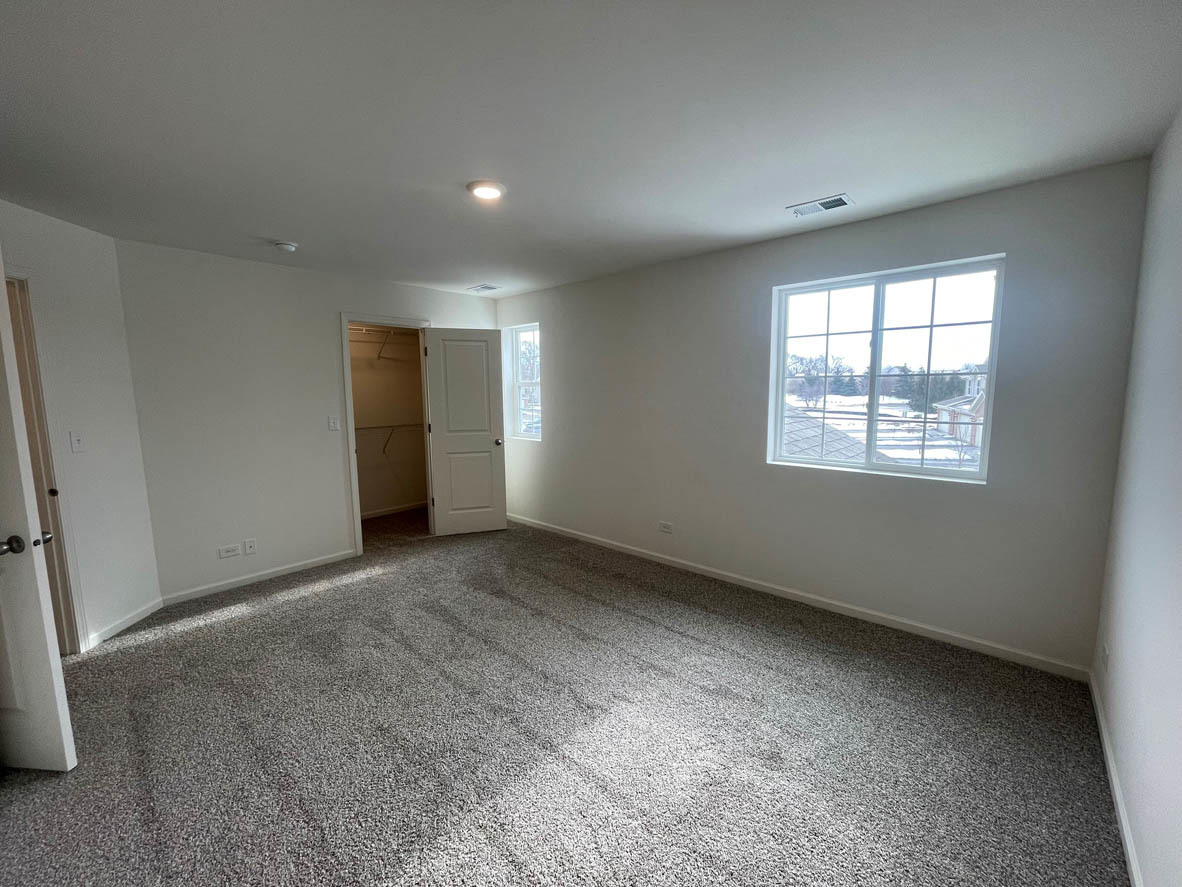 778 Westbury Drive Cary, IL 60013 - Photo 14 of 29 an empty room with a window