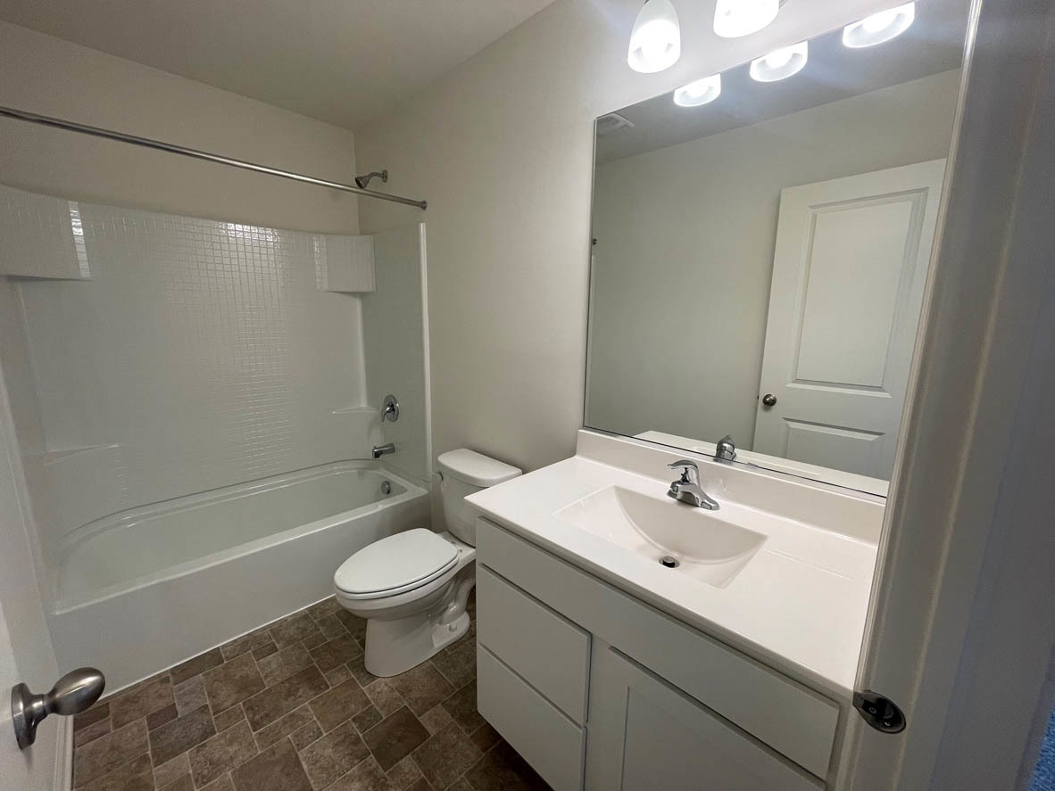 778 Westbury Drive Cary, IL 60013 - Photo 17 of 29 a bathroom with a sink a toilet and shower