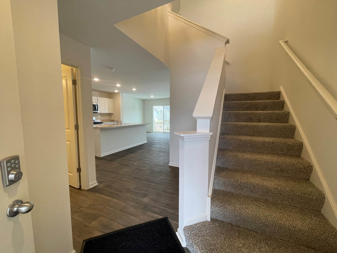 778 Westbury Drive Cary, IL 60013 - Photo 2 of 29 a view of entryway and hall with wooden floor