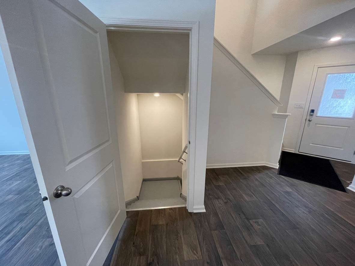 778 Westbury Drive Cary, IL 60013 - Photo 8 of 29 wooden floor in an empty room with a fireplace