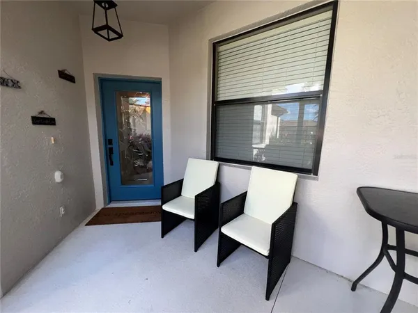 a kitchen with stainless steel appliances a refrigerator sink stove and microwave