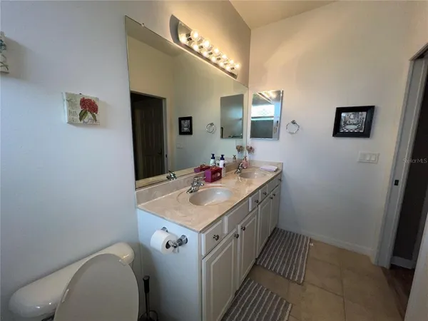 a view of a hallway with a furniture