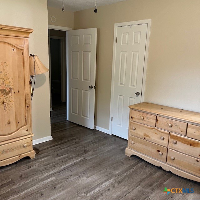 3905 Mariam Road Temple, TX 76502 - Photo 10 of 17 a view of a dresser with wooden floor