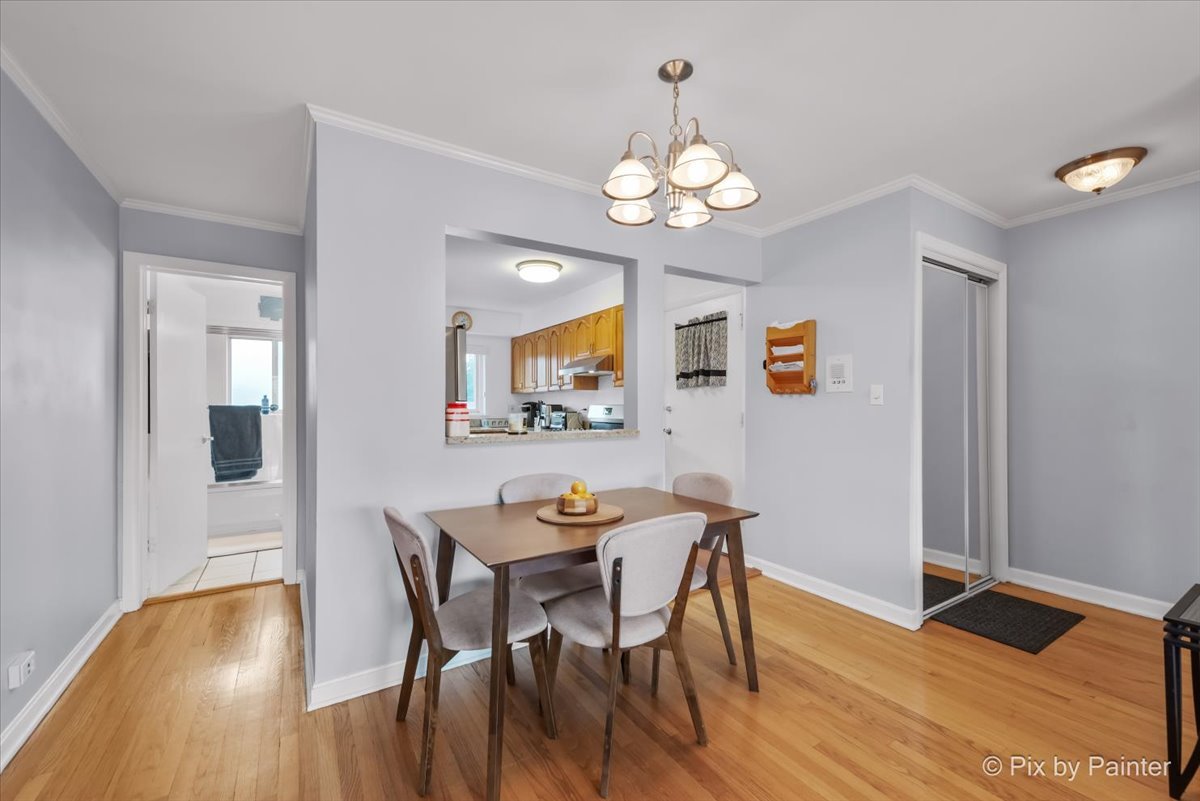 7211 Division Street, Unit C2 River Forest, IL 60305 - Photo 4 of 22 a view of a dining room with furniture and wooden floor