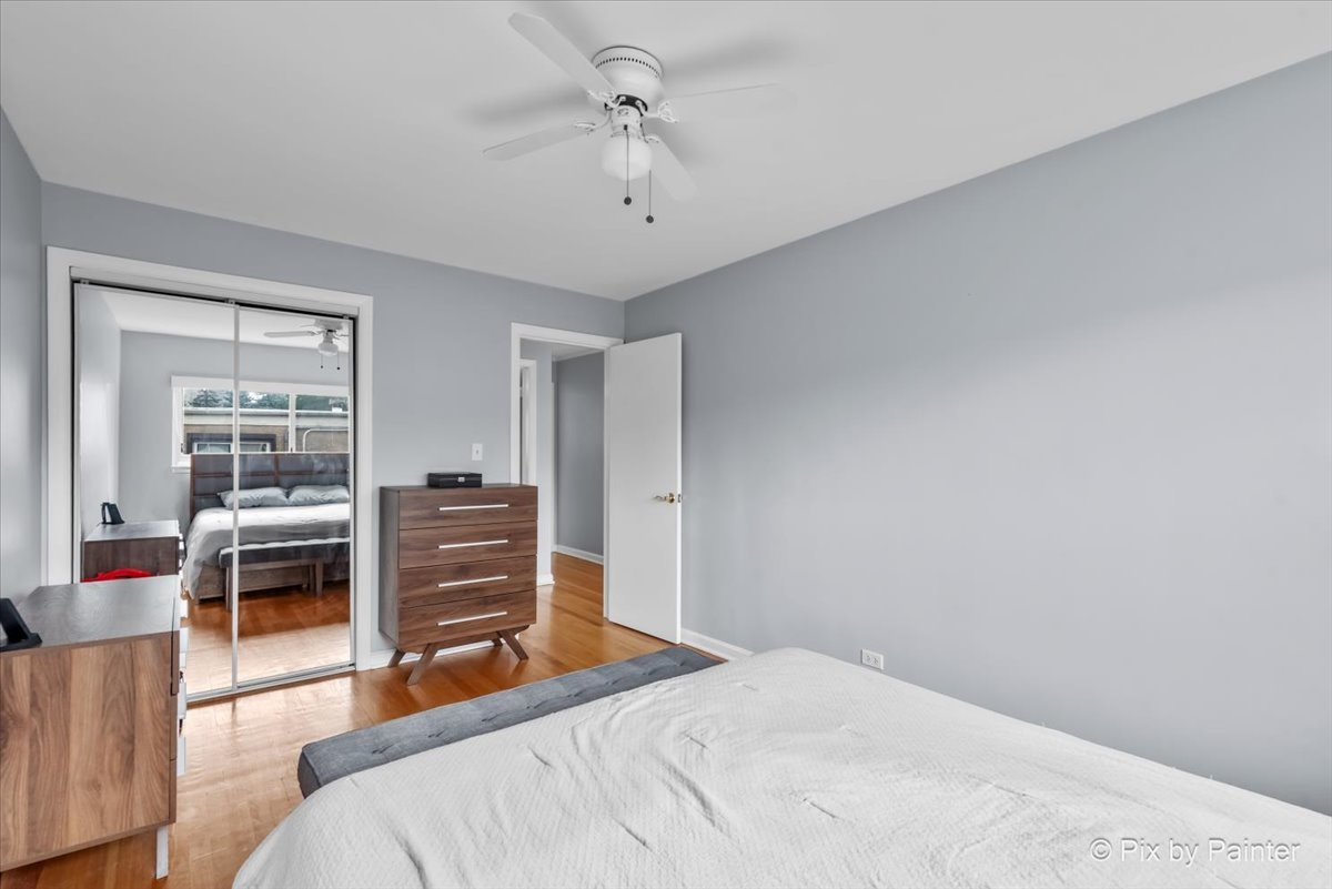 7211 Division Street, Unit C2 River Forest, IL 60305 - Photo 9 of 22 a bedroom with a bed and furniture